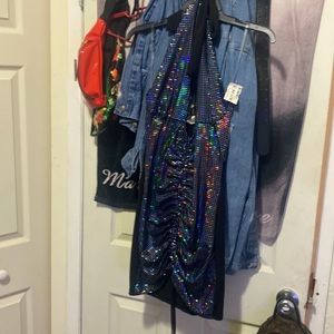 It’s a pretty sequence dress never been worn blue and black